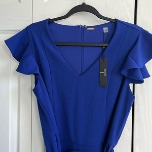 T Tahari size 12 jumpsuit with lovely ruffle sleeve and belt included.